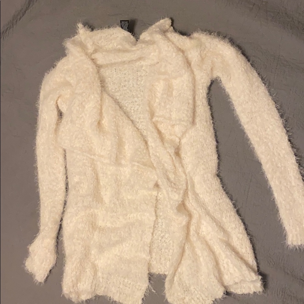 Off- White long sleeve cardigan.